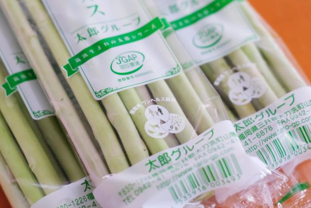 写真：野菜を入れているパッケージに記載されて認証ロゴマーク